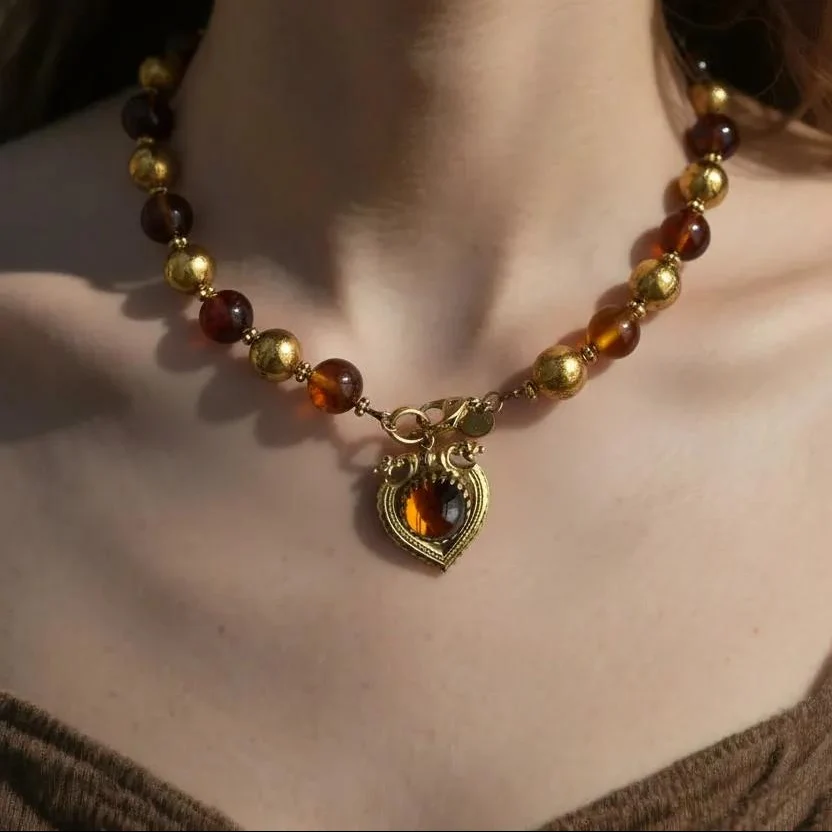 1970s French Brown & Gold Glass Charm Necklace - Image 2